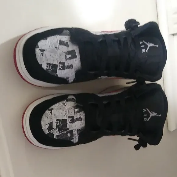 Jordan 1s Newspaper Black and Red High-Top Sneakers
