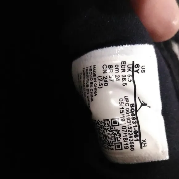 Jordan 1s Newspaper Black and Red High-Top Sneakers
