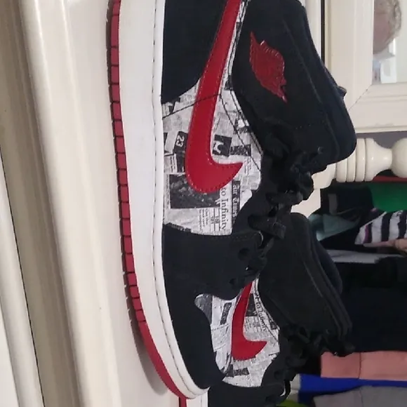 Jordan 1s Newspaper Black and Red High-Top Sneakers