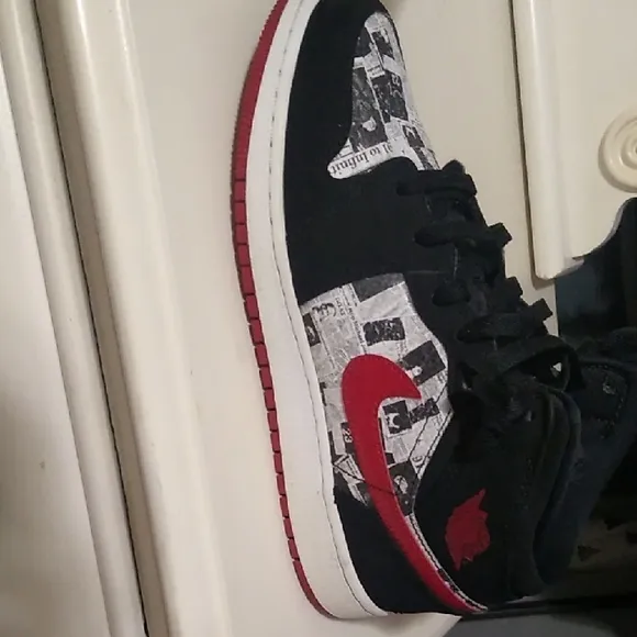 Jordan 1s Newspaper Black and Red High-Top Sneakers